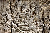 Prambanan - Ramayana reliefs of Shiva temple. Opening scene from Ramayna relief series: detail of five supplicants of Vishnu to the left of the central panel.  